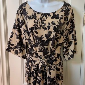 3/4 sleeve tan/floral blouse.
